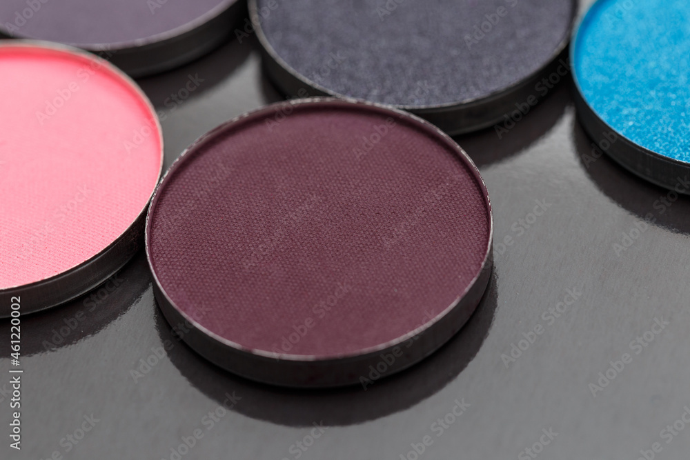 Close-up texture make-up eyeshadow palette. Abstract texture. Colorful colors. Highlighter. Professional make-up product. Flat lay. Macro photography. Set dry eyeshadow Close-up texture make-up eyeshadow palette. Abstract texture. Colorful colors. Highlighter. Professional make-up product. Flat lay. Macro photography. Set dry eyeshadow