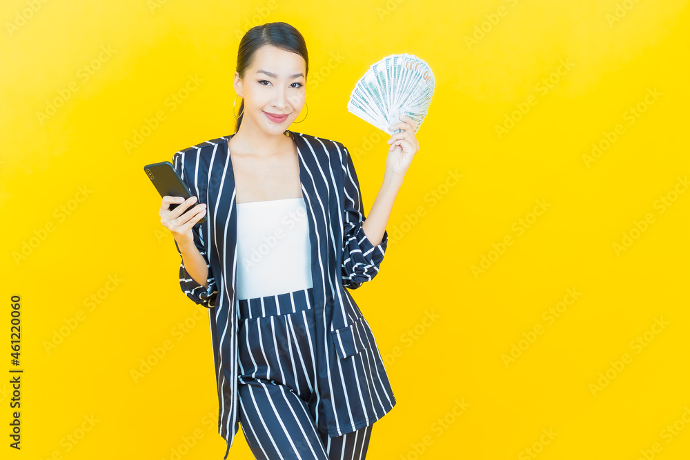 Portrait beautiful young asian woman smile with a lot of cash and money Portrait beautiful young asian woman smile with a lot of cash and money