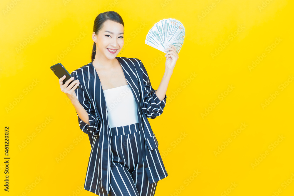 Portrait beautiful young asian woman smile with a lot of cash and money Portrait beautiful young asian woman smile with a lot of cash and money