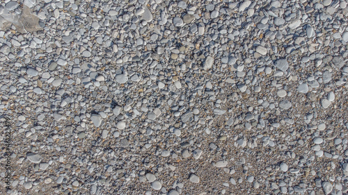 Gray gravel road construction site texture for background, wallpaper, material for texture 3D