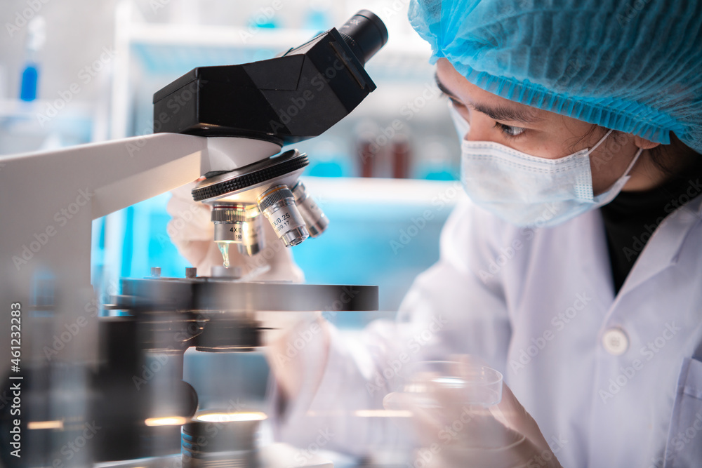microscope in a medical research lab or science laboratory, study for making vaccine to protection a coronavirus COVID-19 microscope in a medical research lab or science laboratory, study for making vaccine to protection a coronavirus COVID-19