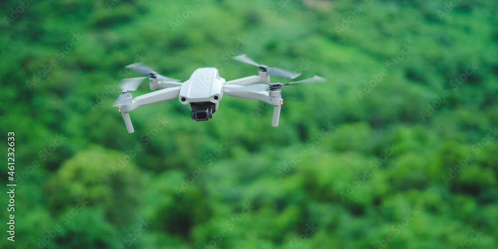 hight technology of helicopter drone for take a photo in aerial top view, flying on sky by remote control, professional aircraft robot innovation hight technology of helicopter drone for take a photo in aerial top view, flying on sky by remote control, professional aircraft robot innovation