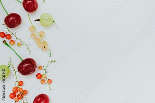 summer fruits and berries on a white background . top view. place for text