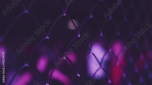 Blurred video clip of people dancing on rave party in night club on background