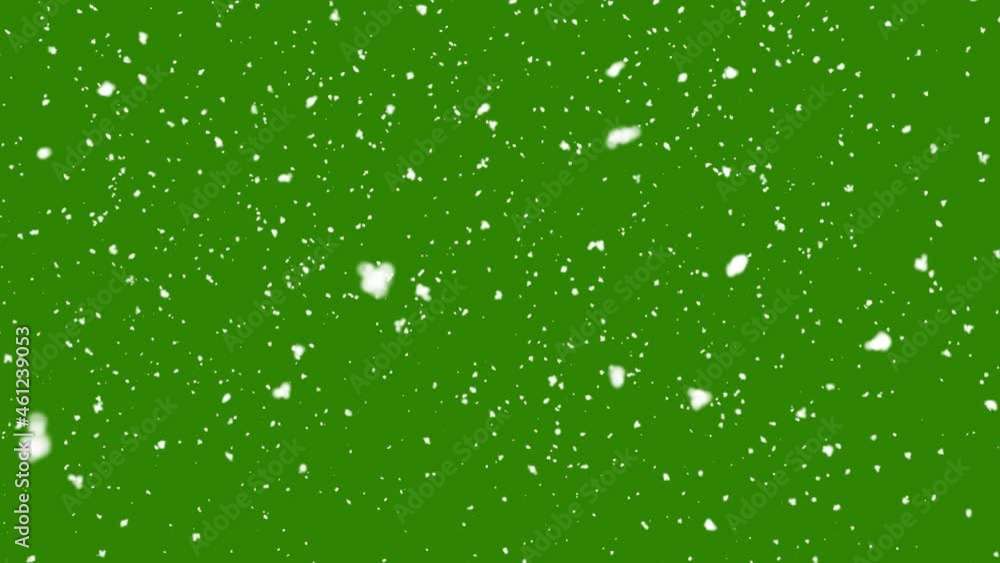 Snow falling on green background Snow falling on green background