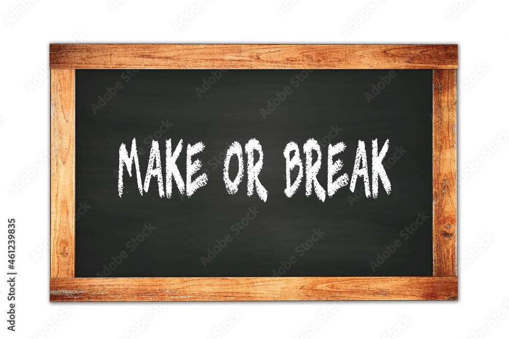 MAKE OR BREAK text written on wooden frame school blackboard. MAKE OR BREAK text written on wooden frame school blackboard.