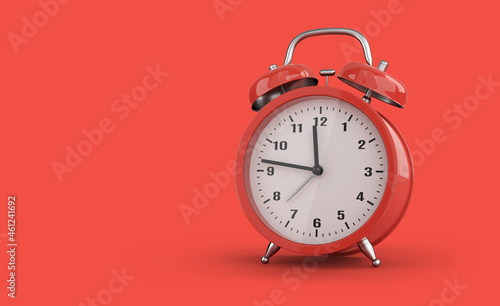 Modern alarm clock on red background