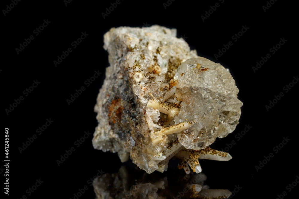 Macro mineral stone fluorite with quartz against black background Macro mineral stone fluorite with quartz against black background