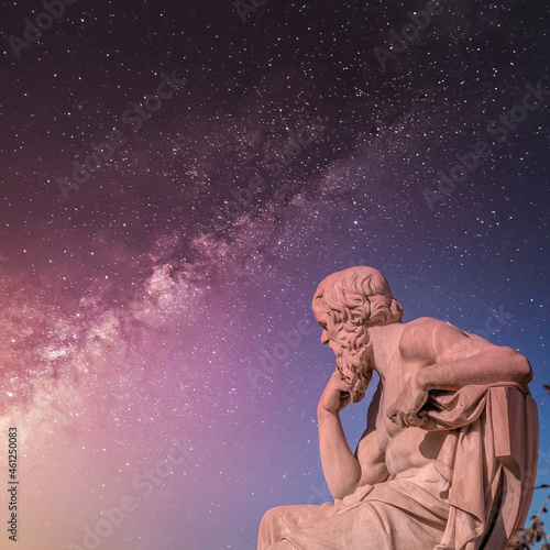 Socrates, the ancient Greek philosopher statue under starry night sky, Athens Greece photo