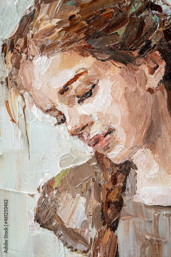 Fototapeta Naklejka Na Ścianę i Meble -  .A young girl reads an interesting book on a light warm background. Oil painting on canvas.