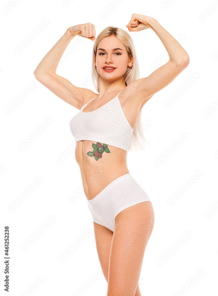 Young beautiful woman in sports underwear isolated on white background Young beautiful woman in sports underwear isolated on white background