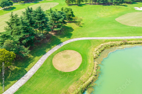 Aerial view of beautiful green golf course.