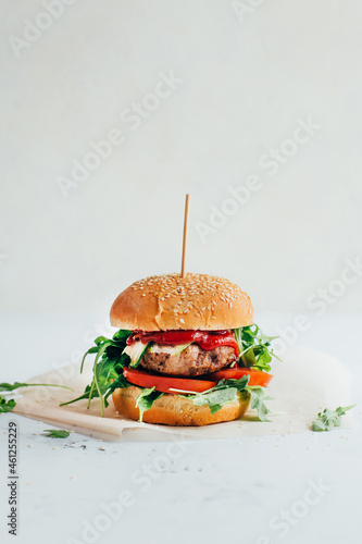close-up of a burger on a white background