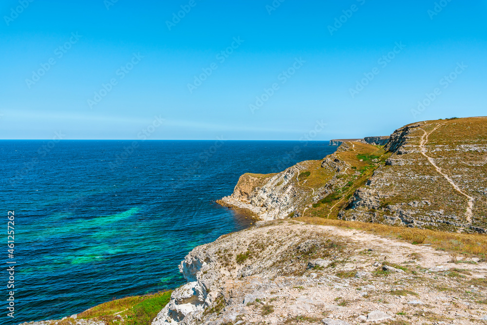 The Dzhangul landslide tract on the western coast of Crimea. Picturesque seascape with azure water