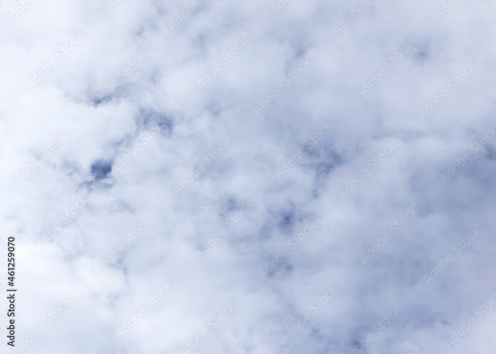 Obraz premium White clouds spread all over blue sky.