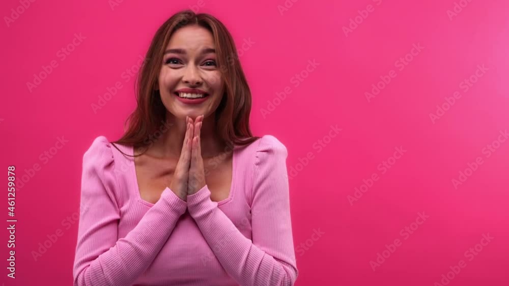 amazed and excited woman clapping hands isolated on pink amazed and excited woman clapping hands isolated on pink