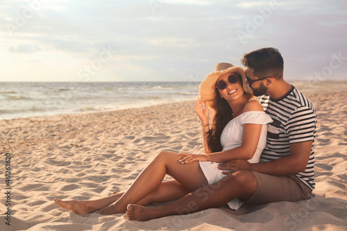 Lovely couple spending time together on beach © New Africa