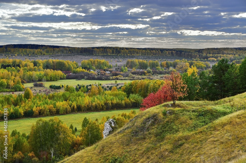 View of the autumn valley of the Sylva River from the top of Podkamennaya Mountain (Western Urals, Perm Territory)