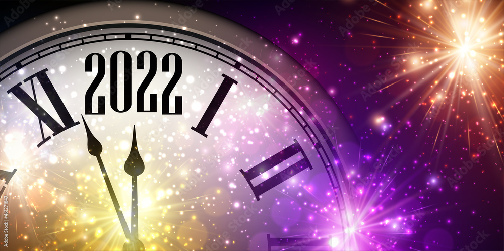 Fototapeta Half hidden clock showing 2022 with sparkling fireworks.