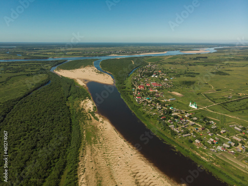 July 2021 - Lomonosovo. Bird's eye view of the village of Lomonosovo. Russia, Arkhangelsk region, Kholmogorsky district  photo