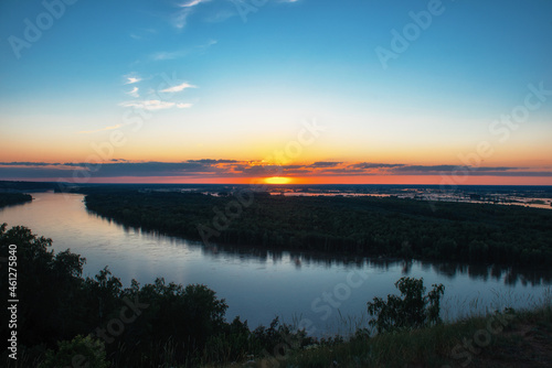 Aerial drone view of river landscape in sunny summer sunset. Top view of siberian Ob river from high attitude in summer sunset. Panorama  bird s eye view
