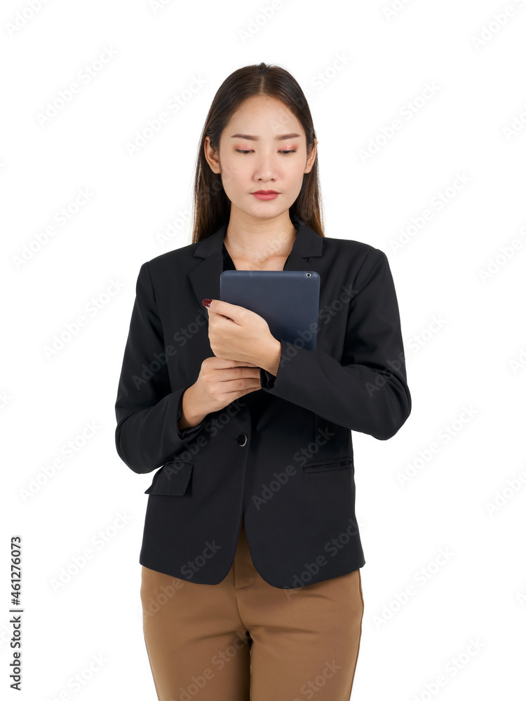 Young asian businesswoman in a black suit holding a tablet computer. Portrait on white background with studio light. Young asian businesswoman in a black suit holding a tablet computer. Portrait on white background with studio light.