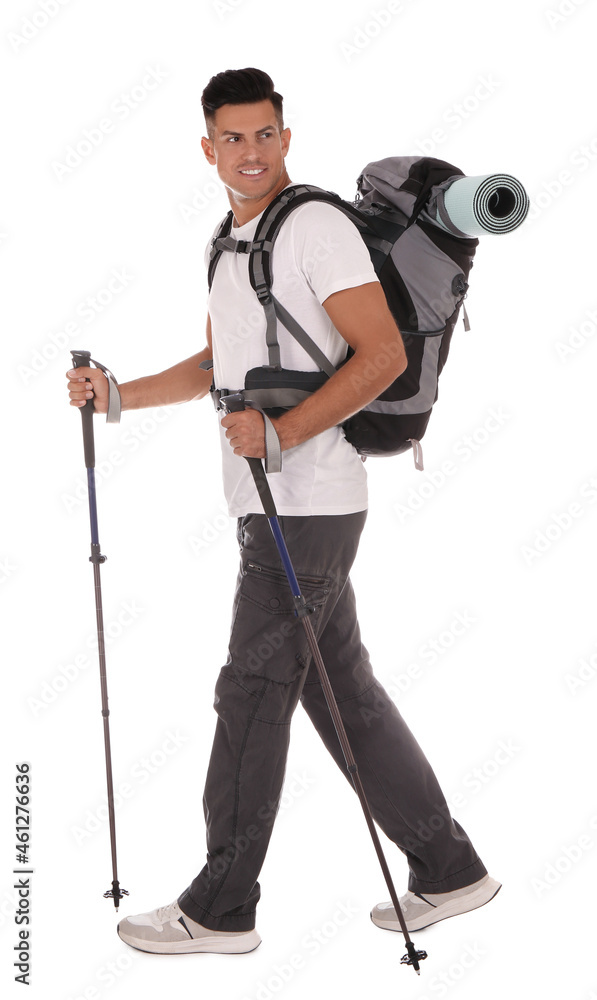 Male hiker with backpack and trekking poles on white background Male hiker with backpack and trekking poles on white background