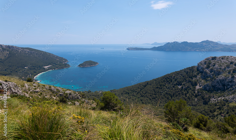 The south coast of Formentor peninsula in the east of the Mediterranean island of Mallorca seen from the highest point. Below is a beautiful bay and also a view of Mallorca's east coast.