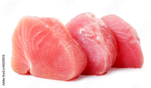 Raw tuna fish medallions on a white background. Isolated