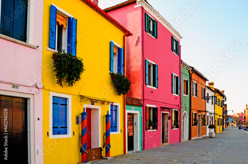 Europe. Italy. Veneto. Burano. The colorful houses of the village of Burano and the leaning tower. © BTWImages