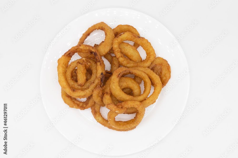 Overhead View of Delicious Onion Rings on a White Plate Overhead View of Delicious Onion Rings on a White Plate
