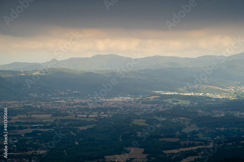 panoramic town of la garriga with summer storm black clouds, catalonia spain photo