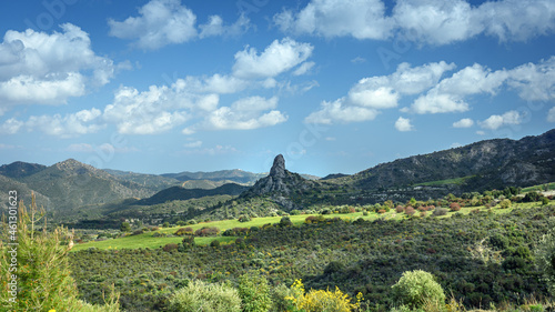Panoramic view of the river Sirkatis valley with the impressive standalone rock of Kourvellos in the middle (Lefkara area, Cyprus) photo