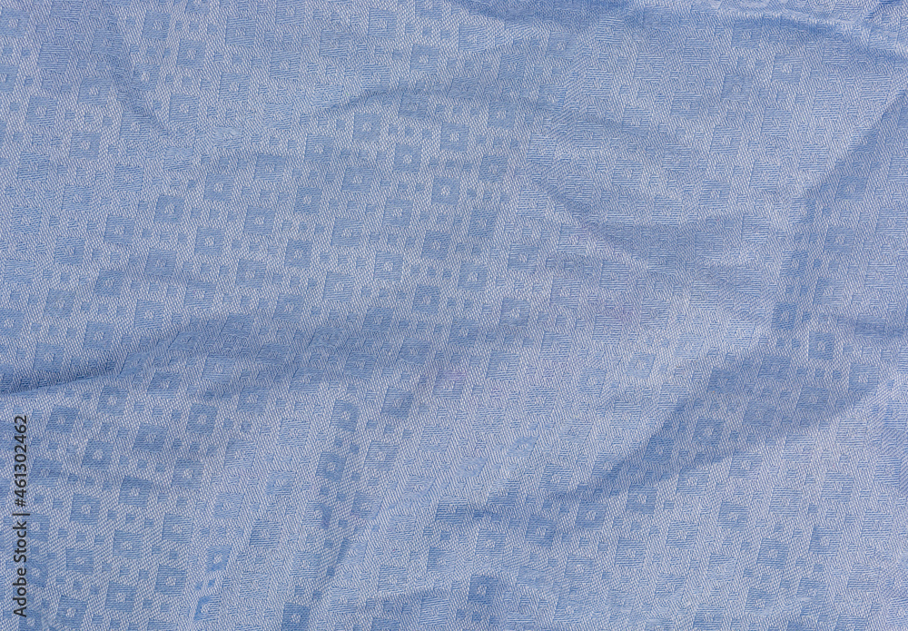 folds of blue fabric textured background close up folds of blue fabric textured background close up