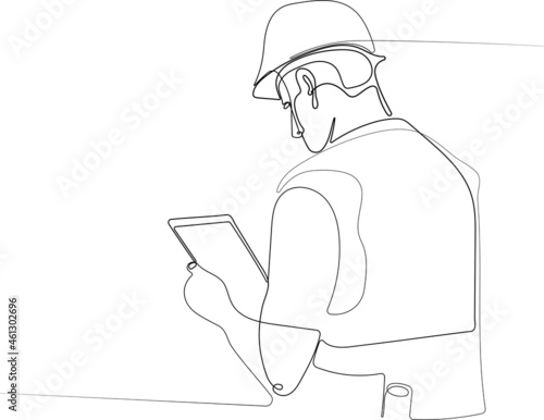 Close up of young Caucasian smiling worker with helmet on head using tablet for work while standing in warehouse. Vector illustration