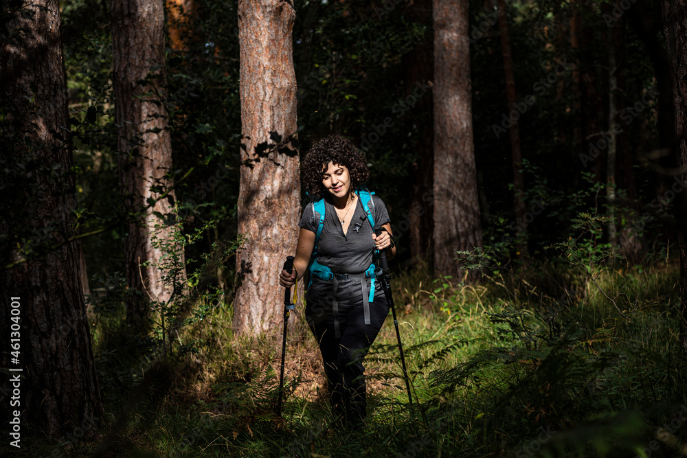 girl walking in the woods