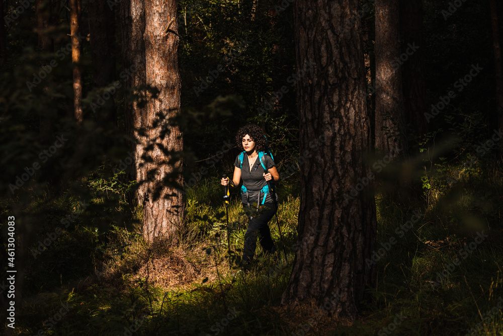 girl walking in the woods