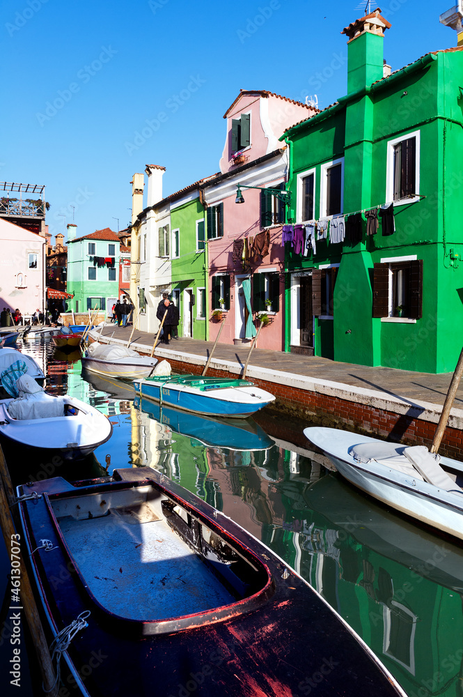 Europe. Italy. Veneto. Burano. Coloured houses along canal in Burano town