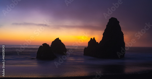 Rodeo Beach in San Francisco, sunrise on the beach, rocks, sand, waves and sun, vivid colors
