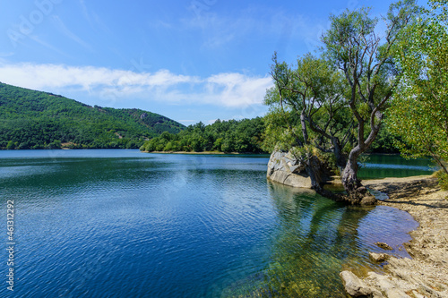 View of the Ruesga reservoir in Cervera de Pisuerga, Palencia, Spain. Calm and tranquility photo