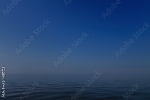 Foggy blue sea, beautiful seascape with copy space