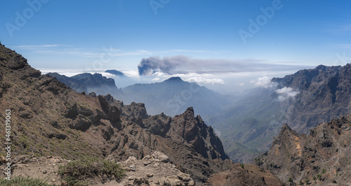 Panoramic view of Cumbre vieja from Caldera de Taburiente. Volcano smoke above the clouds. La Palma. Canary Islands
