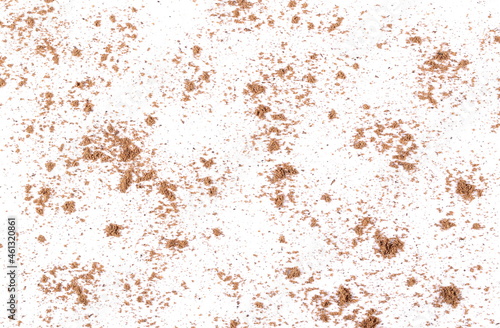 Pile ground, milled nutmeg powder isolated on white background and texture, top view 