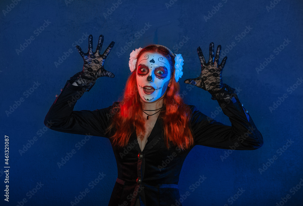 Beautiful woman with scary Halloween make up dead day