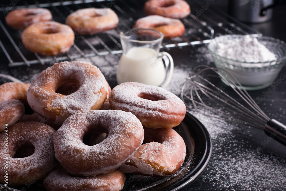 Delicious doughnuts with powdered sugar Delicious doughnuts with powdered sugar