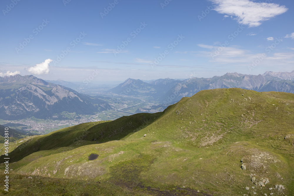 Fototapeta premium Amazing hiking day in one of the most beautiful area in Switzerland called Pizol in the canton of Saint Gallen. What a wonderful landscape in Switzerland at a sunny day.