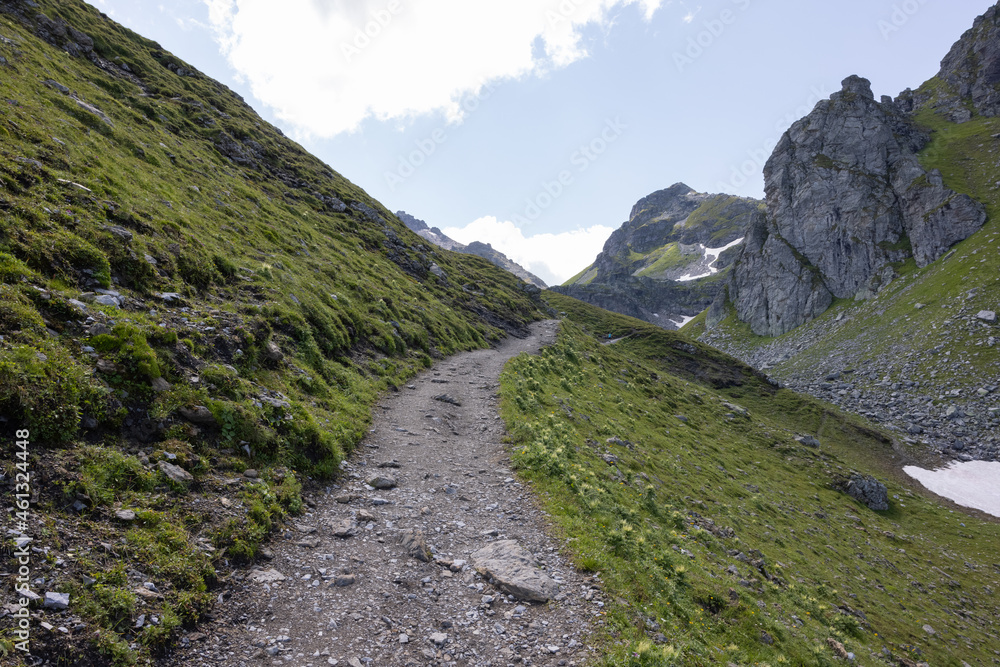 Obraz premium Amazing hiking day in one of the most beautiful area in Switzerland called Pizol in the canton of Saint Gallen. What a wonderful landscape in Switzerland at a sunny day.