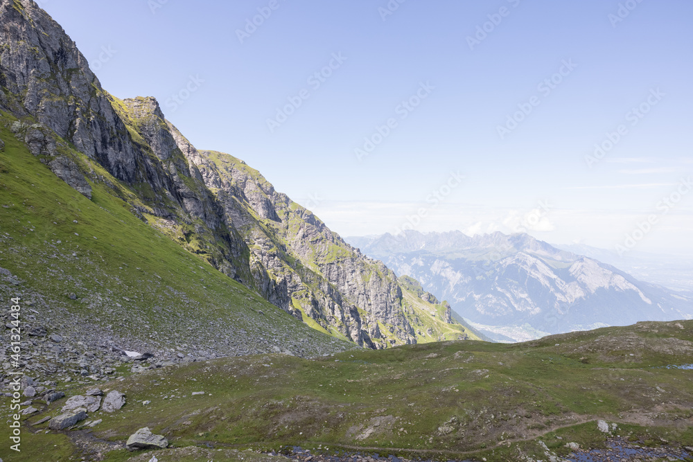 Fototapeta premium Amazing hiking day in one of the most beautiful area in Switzerland called Pizol in the canton of Saint Gallen. What a wonderful landscape in Switzerland at a sunny day.