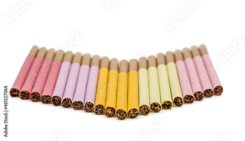 cigarettes of different colors on white background