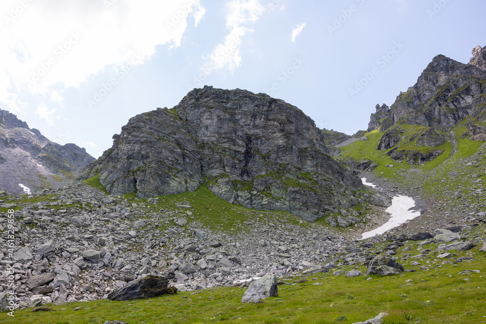 Obraz premium Amazing hiking day in one of the most beautiful area in Switzerland called Pizol in the canton of Saint Gallen. What a wonderful landscape in Switzerland at a sunny day.